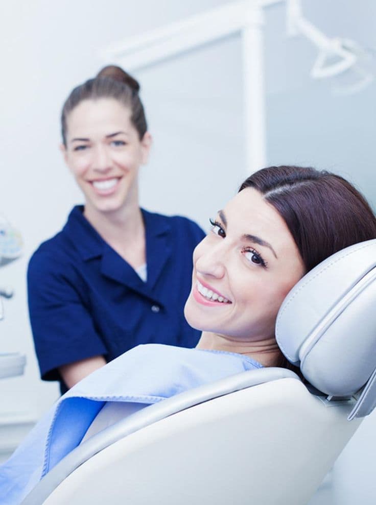 Happy patient showing beautiful smile